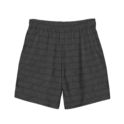 the capital swim shorts from the back in black featuring an all-over 'just say when' pattern.