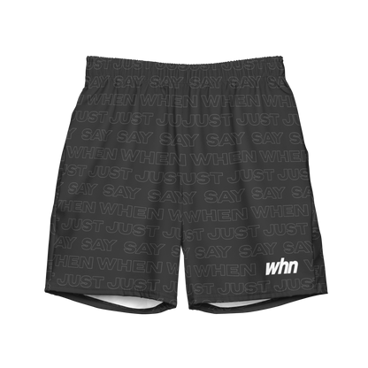 the capital swim shorts from the front in black featuring an all-over 'just say when' pattern and white whn logo near the hem.