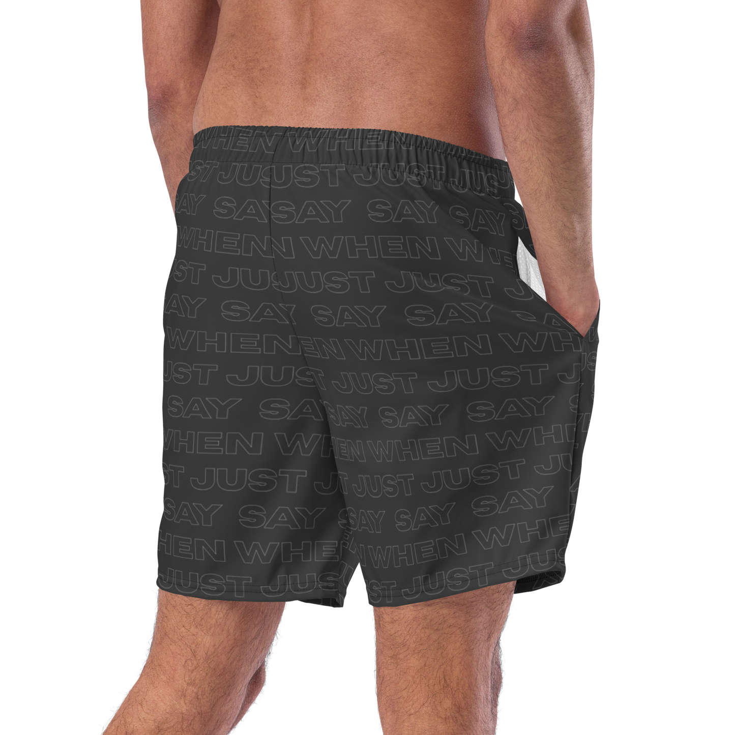 back view of the model wearing the capital swim shorts in black featuring an all-over 'just say when' pattern.