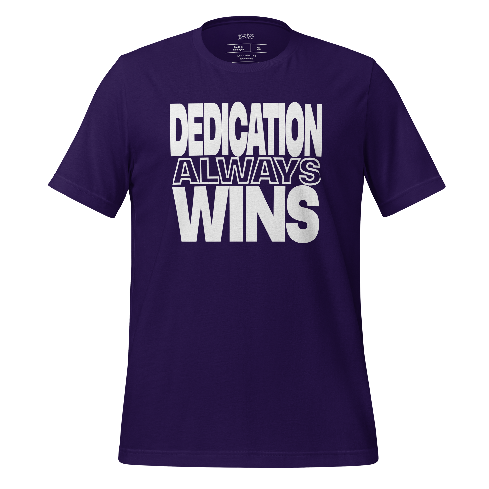 the dedication shirt in purple featuring bold white text that reads 'dedication always wins' across the chest.